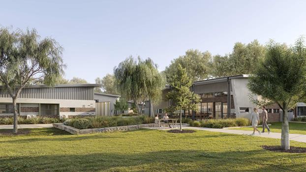 Single-storey modern accommodation building surrounded by landscaped communal and socialisation areas.