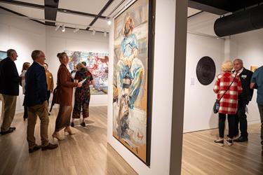 People viewing Biennial Art Award artwork at the UniSQ Art Gallery, Toowoomba.