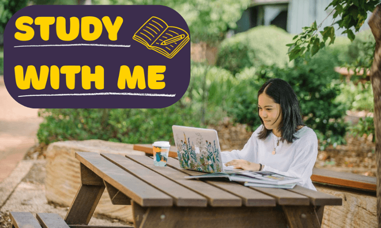 A woman sits at a wooden picnic table outdoors, working on a laptop, with a coffee cup nearby and a "Study With Me" graphic in the corner.