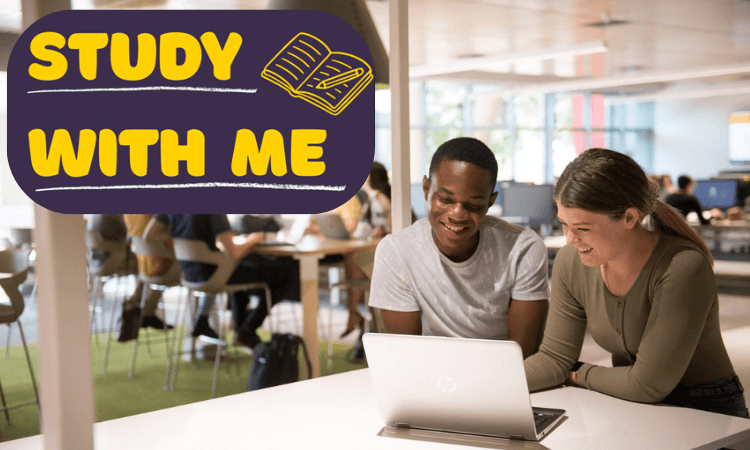 Two students sit together at a table using a laptop in a library; a sign reads "STUDY WITH ME" with an illustration of a notebook and pen.