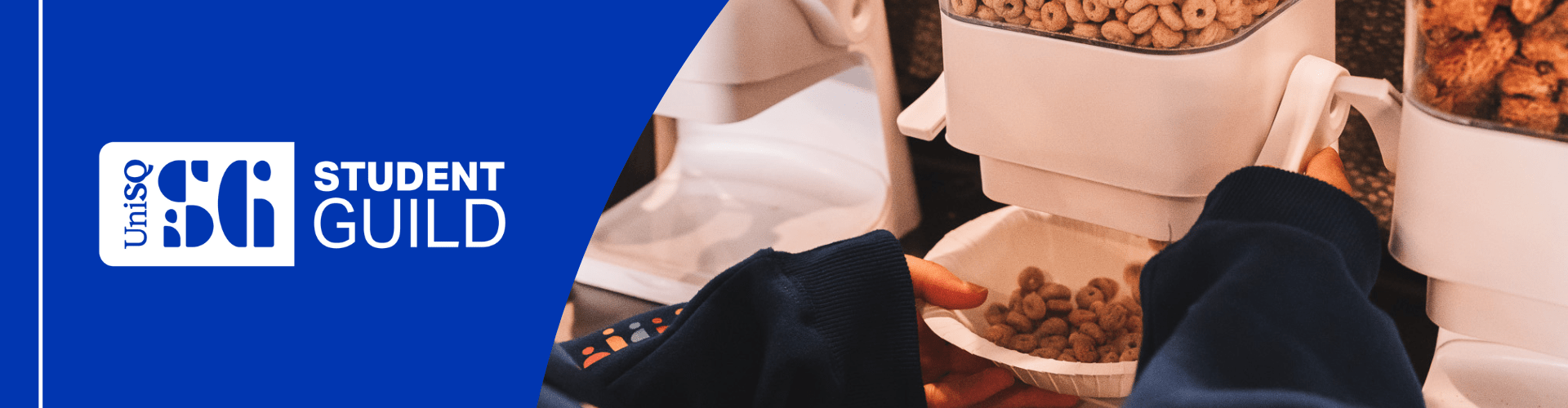 A person dispenses cereal into a bowl from a machine. Student Guild logo on a blue background.