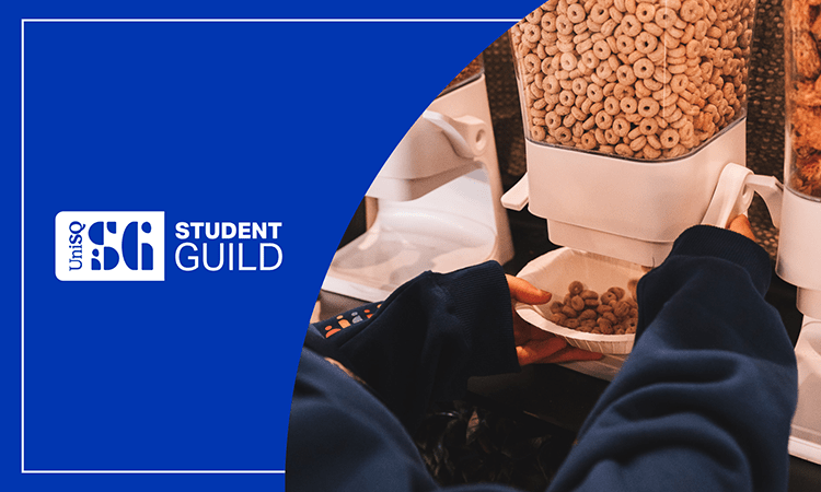 Person filling a bowl with cereal at a food station. Student Guild logo on blue background.