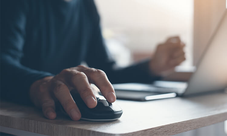 Student holding computer mouse