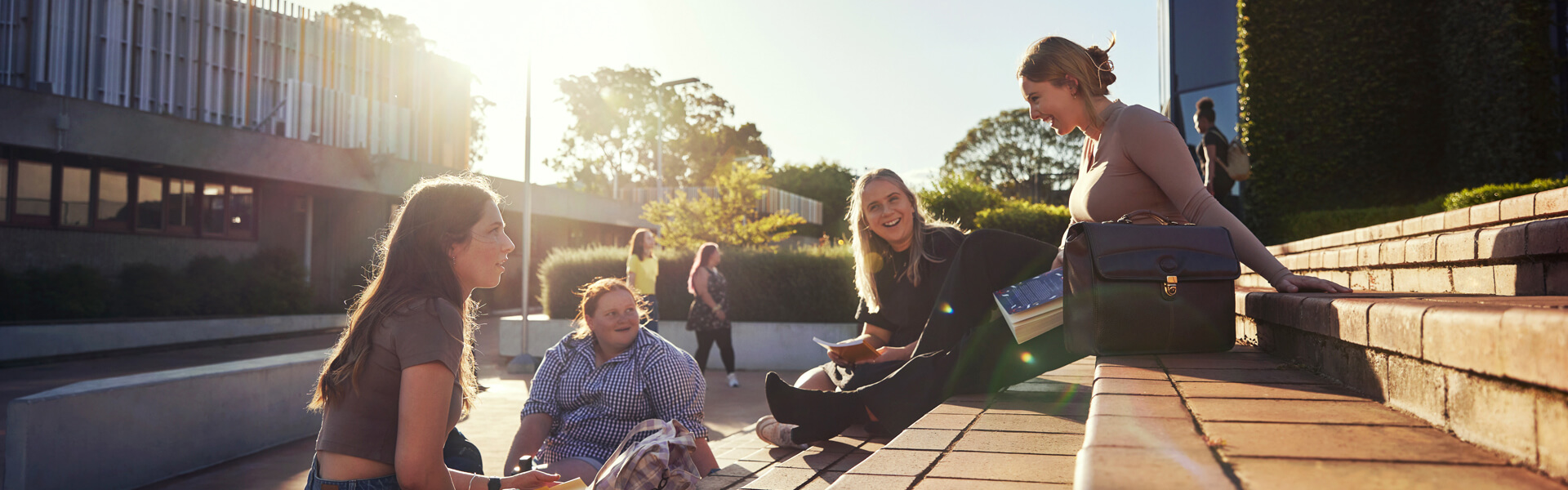 Student on steps at UniSQ Toowoomba