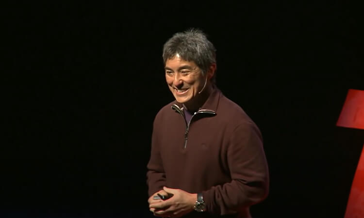 Man talking on a Ted Talk.