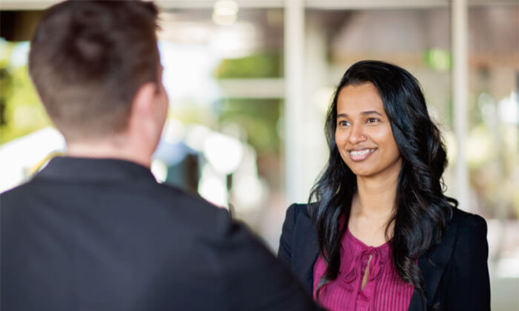 Student shaking hands