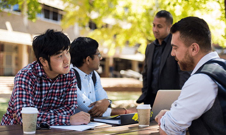 Students sitting outside