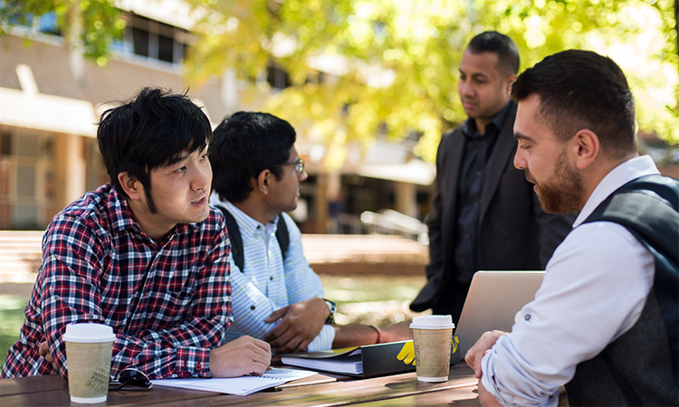 Students sitting outside
