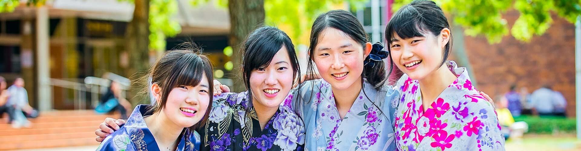 Japanese students smiling in group