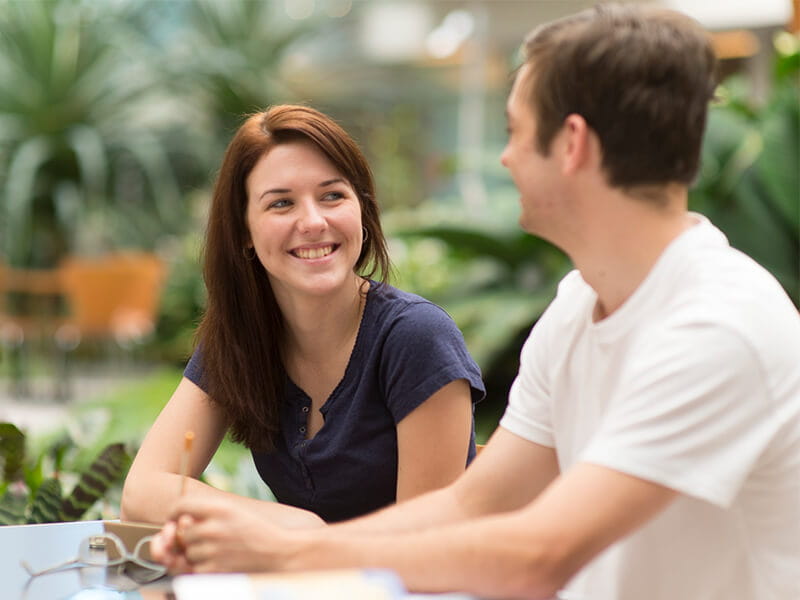 two students smiling