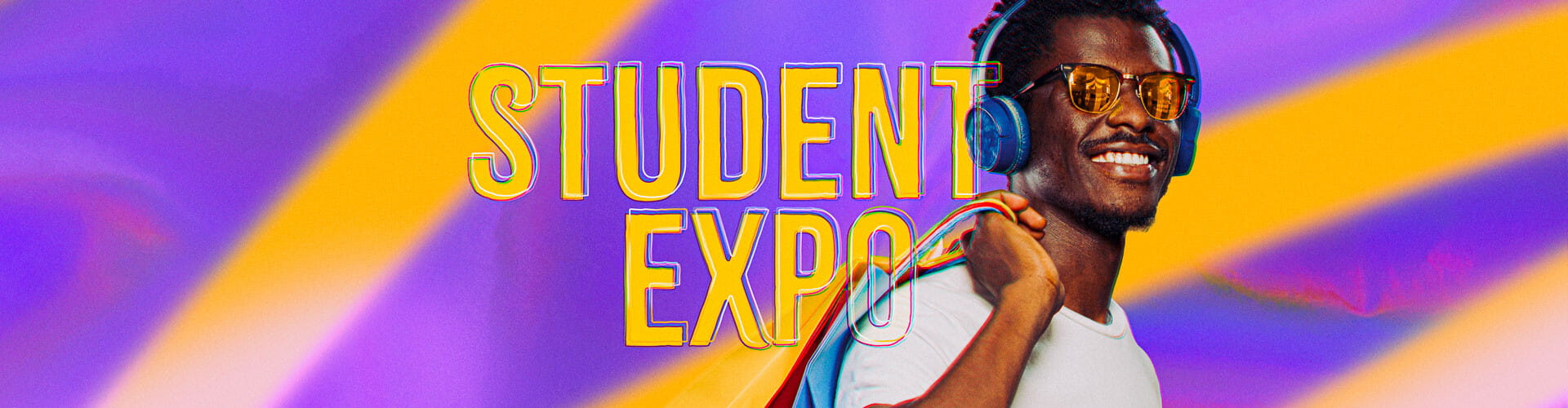A person walking with headphones on smiling at camera and holding a bag over shoulder. Background is bright colours with the words 'Student Expo'. 