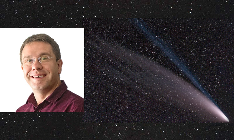A man with glasses and a burgundy shirt smiles on the left. On the right is a night sky with a bright comet and a long tail.