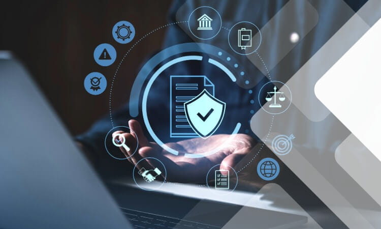 A person uses a laptop with digital icons representing cybersecurity, data protection, and compliance floating above their hand.