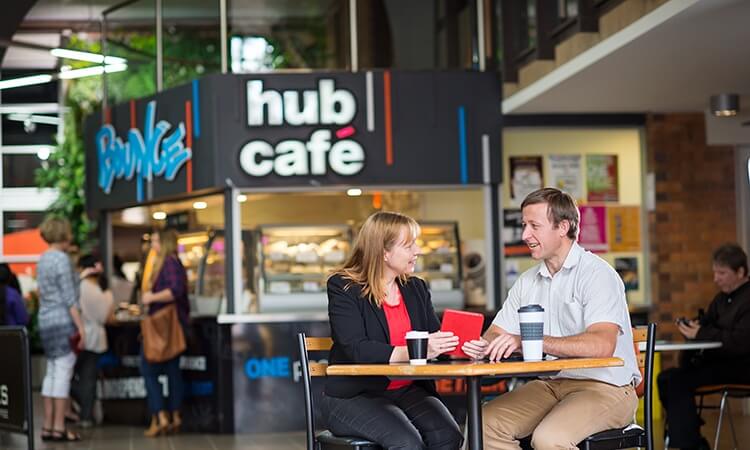People chatting outside the Hub Cafe in Toowoomba