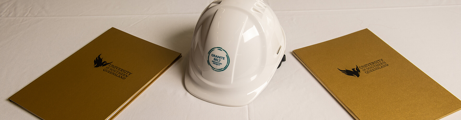 Hard hat and paper