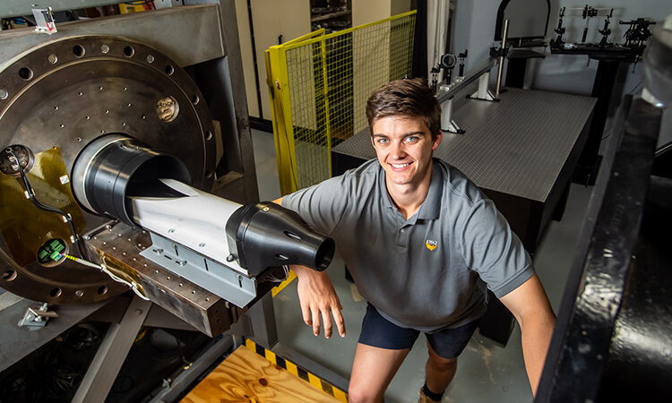 man with wind tunnel