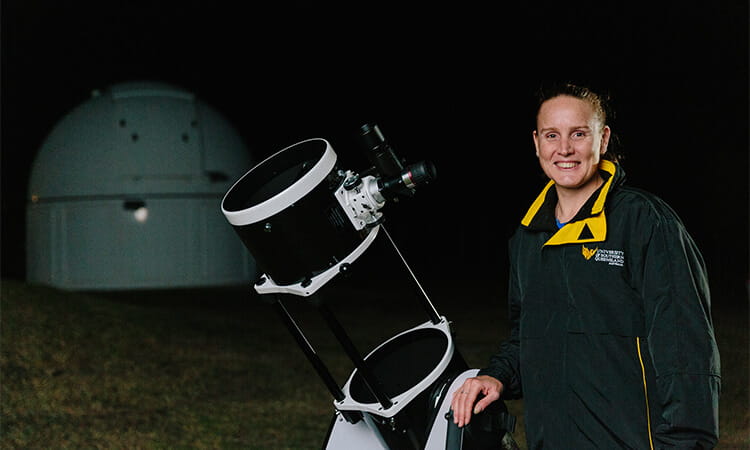 woman with telescope