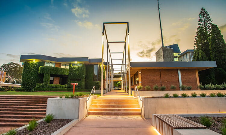 the entrance to the university up in lights 