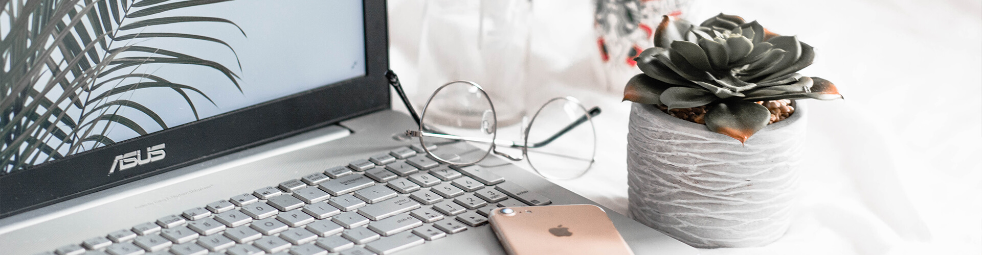 Laptop and glasses.