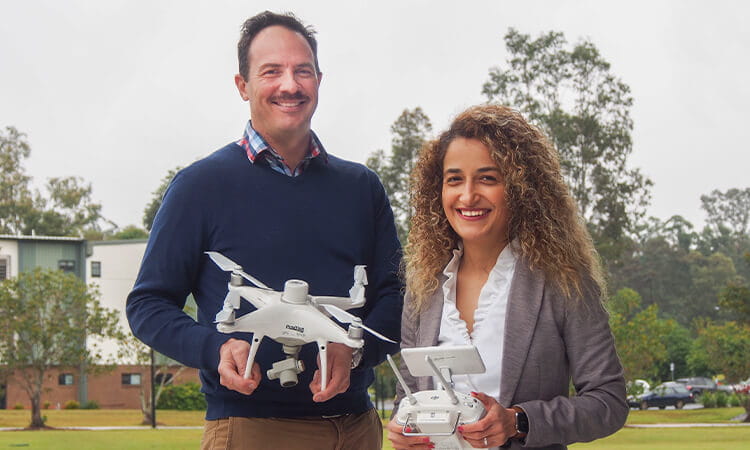 People holding drones.