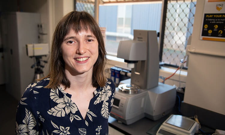 woman smiling in lab