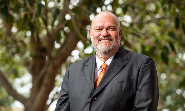 man in suit smiling 