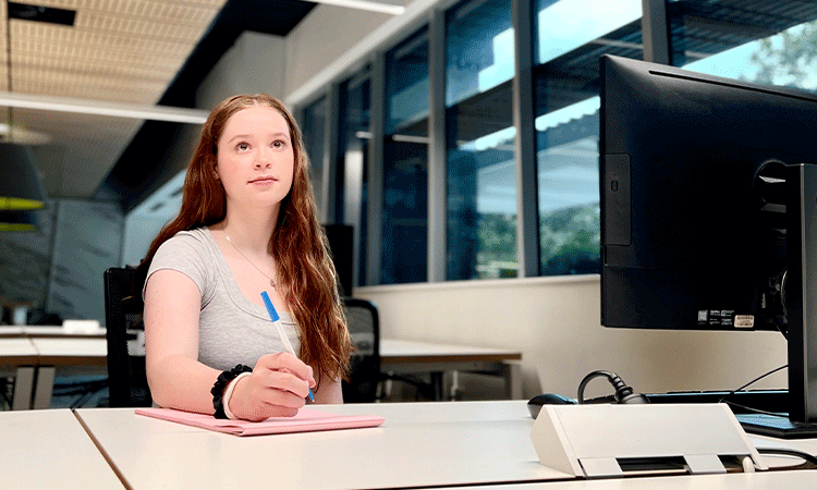 Girl at computer.