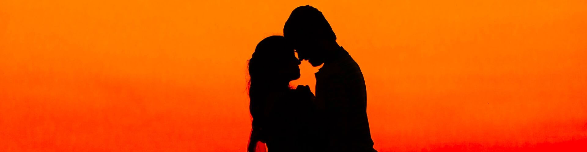 lovers with a sunset background
