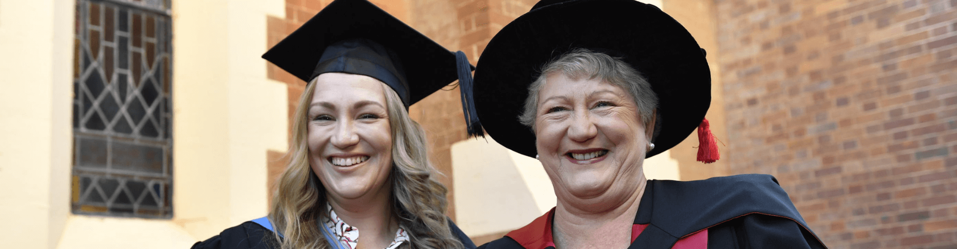 Mother and Daughter graduates.