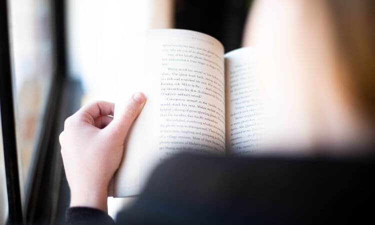 someone reading a book