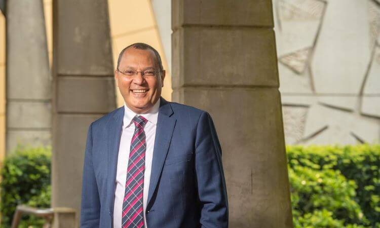 man in suit smiling 