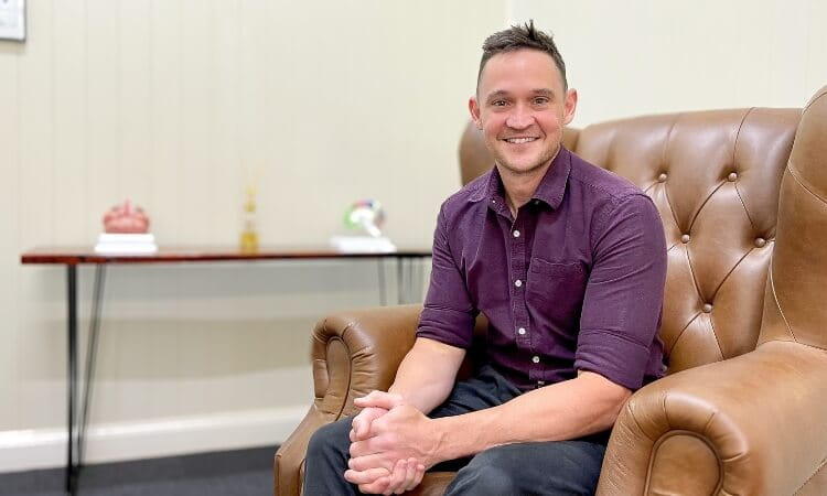 Man sitting in his office.