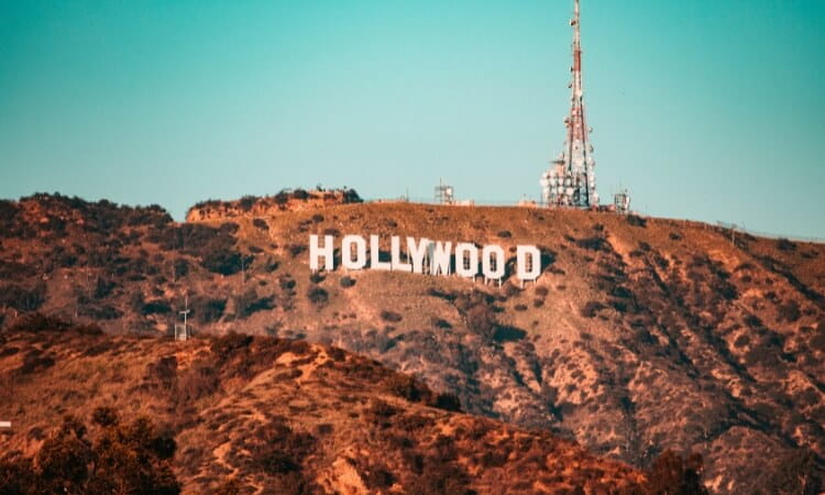 The Hollywood sign on a hillside during the daytime.