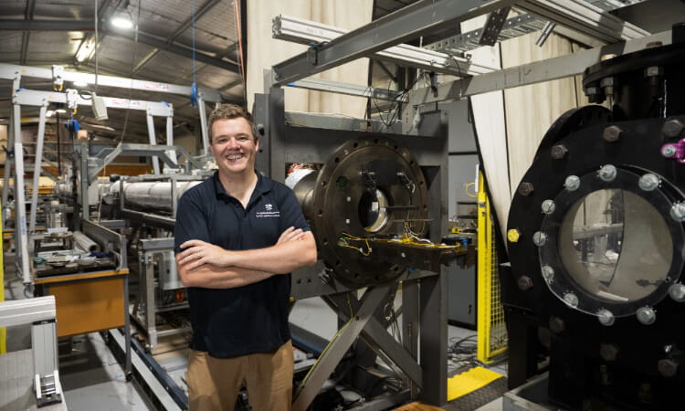 Project lead Dr Byrenn Birch pictured inside the hypersonic wind tunnel facility at UniSQ.