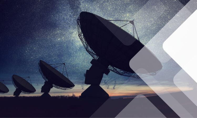 A satellite dishes in the sky.