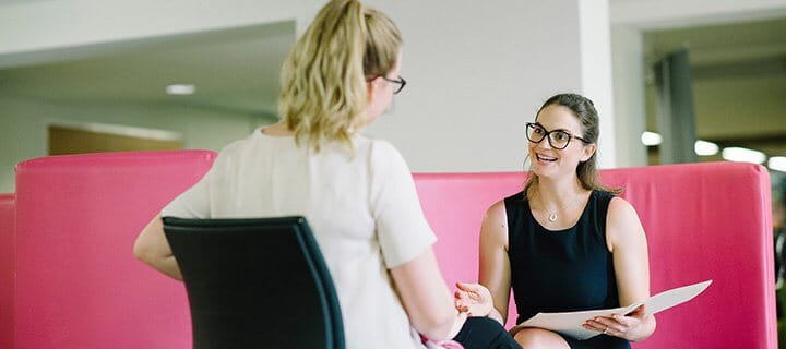 Two people during a counselling session. 