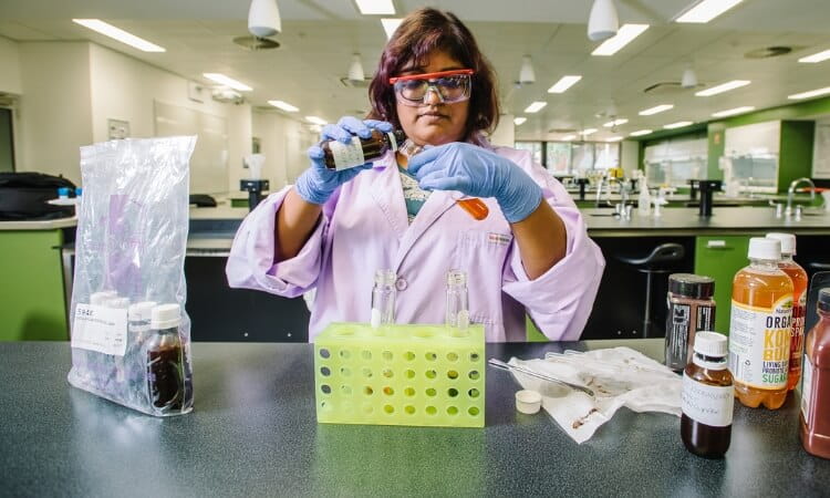 a woman conducting food testing experiements