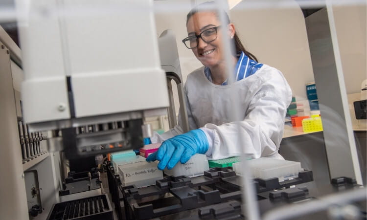 a woman working in the molecular laboratory