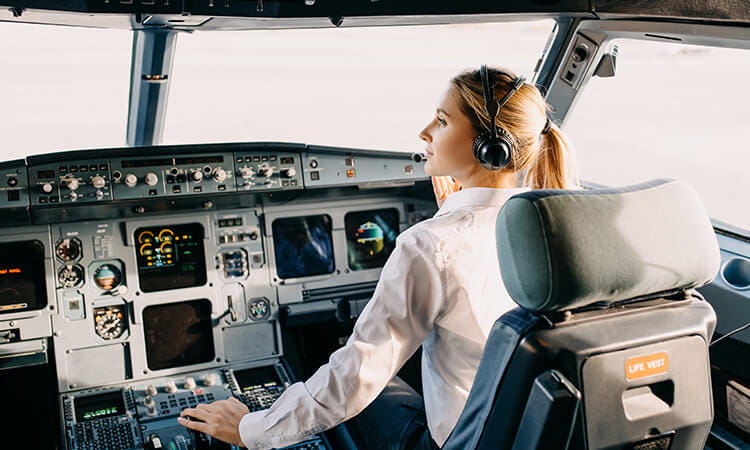 A pilot Inside the cockpit. 