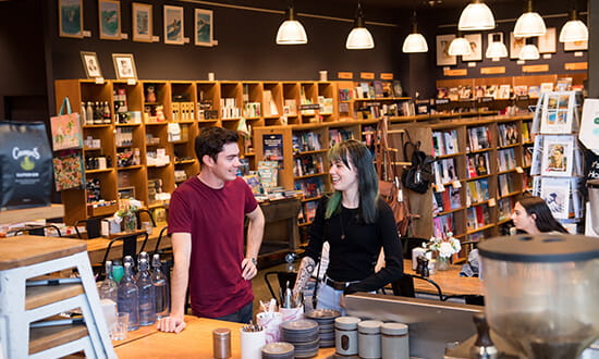 Two students in bookshop.