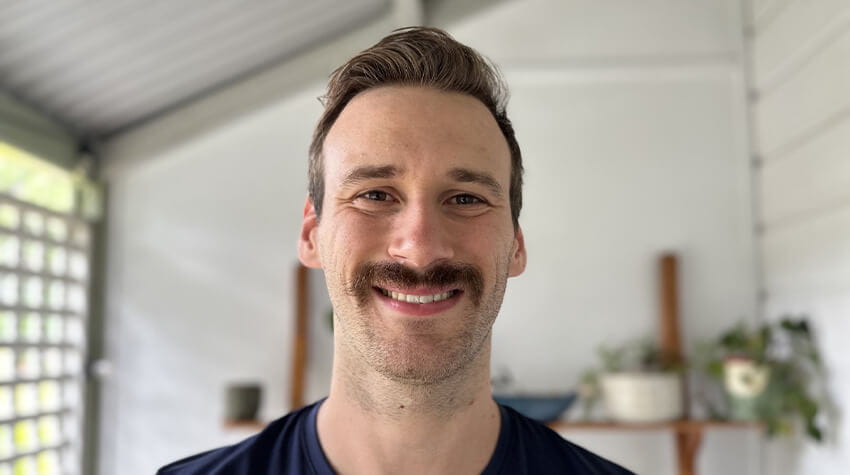 A man smiling at the camera. 