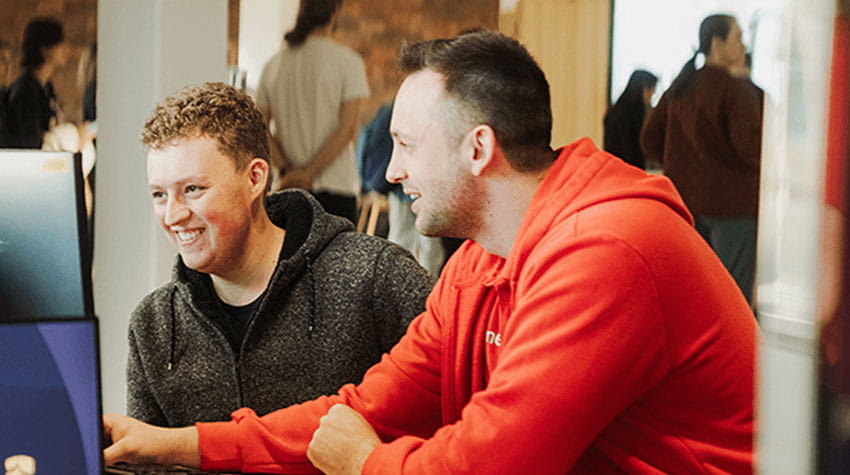 iconnect staff assisting student at the campus information hub.