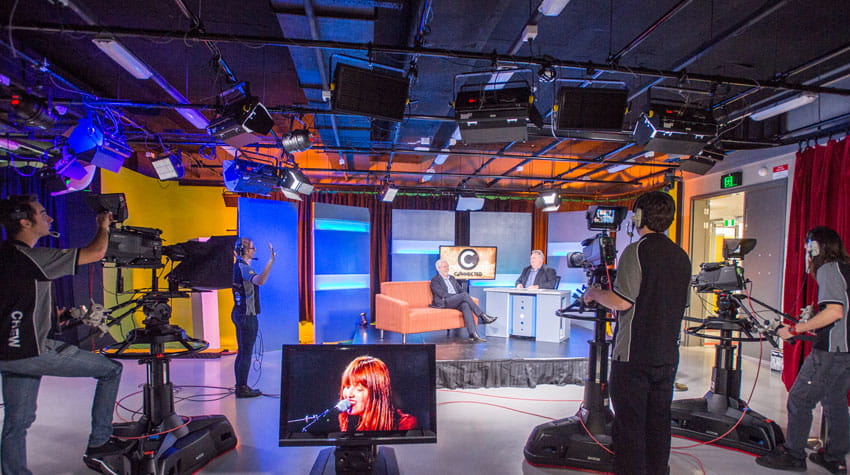 3 UniSQ students each filming an interview at UniSQ's Media Centre.