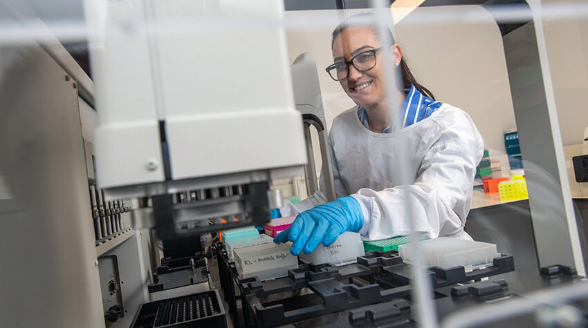 Woman at lab equipment